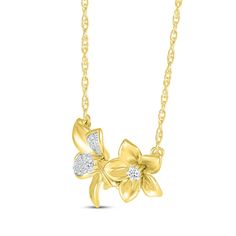 Dewdrops of diamonds decorate this pretty floral necklace. Crafted in 10K yellow gold Two flowers with sculpted petals are centered with a round-cut diamond Petals on the larger flower gleam with composites of round diamonds Total diamond weight is 1/6 carat The pendant is centered on an 18-inch rope chain that secures with a spring ring clasp Two Flowers, Floral Necklace, Diamond Flower, Large Flowers, Rope Chain, Flower Necklace, Round Cut Diamond, Spring Rings, Round Cut