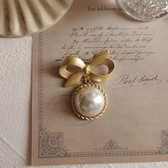 women--bestseller-bow Chic Gold Brooches For Party, Gold Brooch Pins For Party, Vintage Pearl Gold Brooches, Vintage Gold Pearl Brooches, Gold Lapel Pin For Party, Gold Wedding Brooches Chic Style, Gold Wedding Brooches In Chic Style, Chic Gold Wedding Brooch, Gold Chic Wedding Brooches