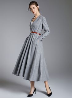 Fitted Fall Midi Dress With Pockets, Fall Long Sleeve Midi Dress With Pockets, Winter Long Sleeve Midi Dress With Pockets, Wool Buttoned Workwear Dresses, Fall A-line Midi Dress With Pockets, Chic Fall Midi Dress With Pockets, Winter Wool Dresses With Buttons, Winter Long Sleeve Tweed Dress With Buttons, Long Sleeve Dress With Pockets For Fall