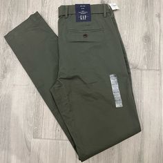 Brand New Never Worn. Tags Attached. Classic Gap Tapered Leg Pants, Classic Tapered Leg Pants By Gap, Classic Tapered Leg Gap Pants, Classic Gap Bottoms With Welt Pockets, Gap Straight Leg Pants, Gap Green Pants With Pockets, Gap Green Cotton Pants, Green Cotton Pants By Gap, Gap Fitted Cotton Pants