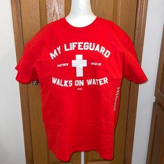 Kerusso Christian My Lifeguard Walks On Water Cross T-Shirt. Verse Referral Is Matthew 14:22-32. Color: Red 100% Preshrunk Cotton, 5.3 Oz Classic Fit T-Shirt Taped Neck And Shoulders Double-Needle Stitching At Sleeve And Bottom Hem My Lifeguard Walks On Water, Water Tshirt, Water Shirt, Walk On Water, Walk On, Colorful Shirts, Tee Shirts, Stitching, Mens Shirts