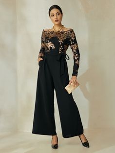 Season:Spring   Fall; Fabric:Sequin; Sleeve Length:Long Sleeve; Look After Me:Hand wash; Gender:Women's; Style:Elegant; Elasticity:Stretchy; Occasion:Wedding,Party; Details:Belt Included,Pocket; Waistline:Medium Waist; Pattern:Floral; Design:Sequins,Pocket,Belted; Neckline:Off Shoulder; Brand:Ador; Pants Type:Wide Leg; Jumpsuit Type:Jumpsuit; Listing Date:09/12/2024; Production mode:External produce; Looseness:Regular Fit; Inclusion:The fabric offers exceptional elasticity and impressive flexibi Evening Fitted Jumpsuits And Rompers With Contrast Sequin, Fitted Evening Jumpsuits And Rompers With Contrast Sequin, Evening Jumpsuits And Rompers With Contrast Sequin, Elegant Fitted Jumpsuits And Rompers With Contrast Sequin, Glamorous Formal Jumpsuits And Rompers With Sequins, Glamorous Formal Sequin Jumpsuits And Rompers, Fitted Sequin Jumpsuits And Rompers For Prom, Elegant Jumpsuits And Rompers With Contrast Sequin For Party, Elegant Evening Jumpsuits And Rompers With Contrast Sequin