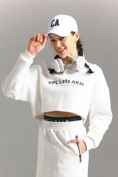 Flaunt what you’ve got in the waist-snatching, 90s-inspired Knitted Polo Pullover. This cool, cropped layering piece has a high neck to keep out the cold, ultra-contouring seamlines, a slight drop shoulder for a chill yet elevated feel. White Long Sleeve Cropped Sporty Sweater, White Crew Neck Crop Top For Winter, Winter White Crew Neck Crop Top, White Casual Cropped Sweater, Sporty Cropped Top For Winter, Polo Pullover, Knitted Polo, Keep Out, Athleisure Women