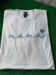 Look good and feel great in the Mama T-shirt! This unique t-shirt is made from soft, breathable cotton and features an embroidered design that looks amazing. Whether you're dressing up or dressing down, you'll stay comfortable while making a statement. What are you waiting for? Get your Mama T-shirt today! Beautiful embroidered T-shirt to celebrate every “Mama” Cotton T-shirt With Embroidered Text, Crew Neck, Cotton T-shirt With Embroidered Graphics, Crew Neck, White Embroidered Relaxed Fit T-shirt, Cotton T-shirt With Embroidered Graphics, White Cotton T-shirt With Embroidered Text, Blue T-shirt With Embroidered Text For Spring, Cotton T-shirt With Embroidered Text And Relaxed Fit, Blue Crew Neck T-shirt With Embroidered Text, Blue Embroidered Crew Neck T-shirt