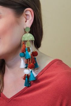 These bold earrings will have you at your best! They are such a fun statement piece! All of those tassels and layers and colors! Just wow! These earrings were meant for making outfits fun! Actual product colors may vary from images shown due to different viewing devices and lighting. Measurements Length: 6" Weight: .6 oz. ALL Jewelry SALES ARE FINAL! Making Outfits, Summer Basics, Bold Earrings, Sequin Shorts, Jumpsuit Shorts Rompers, Swimsuit Dress, Beauty Sale, Maxi Dresses Casual, Tassel Earrings