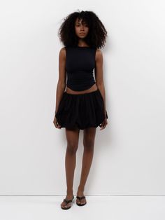 The Balloon Skirt is an ultra voluminous mini skirt featuring an elastic waistband, flat lining, and lightweight cotton poplin fabrication. Balloon Mini Skirt, Top Pearl, Balloon Skirt, High Hips, All Black Everything, Skirt Pattern, Cotton Poplin, All Black, Black Fashion