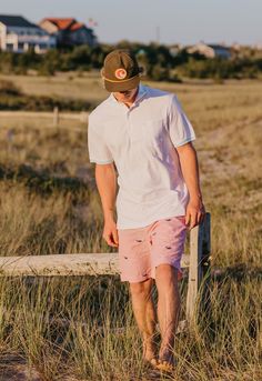 These shorts will take you everywhere, straight from the golf course to the boat, to a summer soirée. Match your family or friends in these shorts made for the Dads and the Chads. You will want to collect them all! Designed on Nantucket 8" inseam Plain front Button closure, zip fly Tailored fit Imported Fabric Made in the Dominican Republic White Cotton Summer Bottoms, White Cotton Bottoms For Warm Weather, White Cotton Golf Bottoms, Cotton Bermuda Swim Trunks For Summer, Summer Bermuda Cotton Swim Trunks, Summer Golf Bottoms Short, Summer Golf Bottoms Short Length, Summer Golf Bottoms In Short Style, Casual White Bermuda Shorts For Vacation