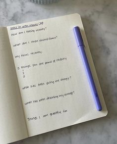 an open notebook with some writing on it