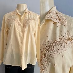 "Vintage 1970s Cut Out Embroidered BLouse by M.C. Miami Creations, FL. In a light mustard yellow, this shirt features floral cut out embroidery, square buttons, and long sleeves. 100% Cotton. In good vintage condition, with a couple of tiny stains. Lael size M Approx Flat Measurements:  Bust: 40\" Waist: 36\" Length: 24.5\" Sleeves: 24\" All measurements are taken with the garment flat, doubled for the chest and waist. Most of our pieces are vintage or antique and have been pre-loved. They will Light Mustard Yellow, Embroidery Square, Cut Work, Embroidered Blouse, Vintage 1970s, Summer Shirts, Mustard Yellow, 20 Years, Blouses For Women