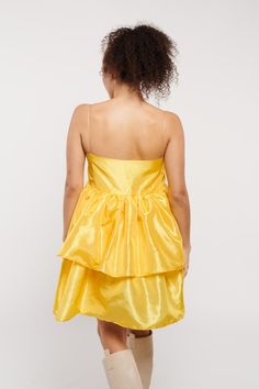 Brighten up any room with our Vibrant Yellow Dress by Madeline Marie. This stunning piece features a bold yellow hue and a playful, voluminous skirt. The sweetheart neckline and spaghetti straps add a touch of femininity, making it perfect for parties, events, and sunny days. Yellow Dresses With Ruffles And Fitted Bodice, Yellow Dresses With Adjustable Straps, Yellow Party Dress With Ruffled Straps, Yellow Dresses With Ruffled Straps For Party, Yellow Strapless Dress With Fitted Bodice, Yellow Cocktail Dress With Spaghetti Straps, Make A Dress, Suede Hat, Midi Dress Formal