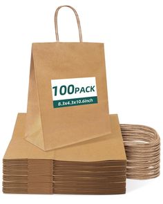 brown paper bags stacked on top of each other with the words 100 pack printed on them