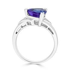 9x9 Violetish Blue AAAA Tanzanite Ring Trillion shape 2.78 ct with 0.07 cttw Diamond in 14K White Gold Product Information SKU TTR0001/3 Metal Type 14K Metal Color White Gold Ring Style Solitaire Primary Stone Gemstone Name Tanzanite Gemstone Species Zoisite No. Of Gemstones 1 Gemstone Shape Trillion Gemstone Weight 2.78 Gemstone Size 9x9 Origin Tanzania Secondary Stone Gemstone Name Diamond Gemstone Species Diamond No. Of Gemstones 19 Gemstone Shape Round Gemstone Weight 0.07 Gemstone Size - Or