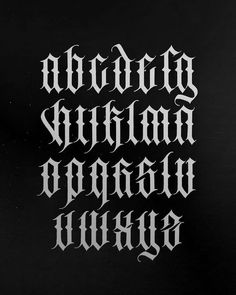 an old english type of calligraphy in black and white, with the letters added to it