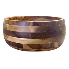 a wooden bowl that is made out of wood and has stripes on the outside of it