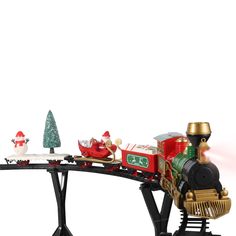 a toy train with santa clause riding on it