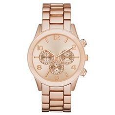 a women's rose gold tone watch with diamonds on the dial and two - tone bracelet