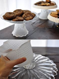 there are two plates with cookies on them and one has a hand pointing at it