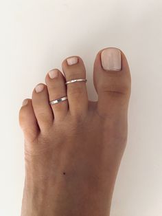 Minimalist Nickel-free Open Band Midi Rings, Adjustable Hypoallergenic Open Toe Ring, Adjustable Dainty Toe Rings In Sterling Silver, Dainty Adjustable Nickel-free Toe Rings, Adjustable Dainty Sterling Silver Toe Rings, Minimalist Adjustable Sterling Silver Toe Rings, Adjustable Minimalist Sterling Silver Toe Rings, Adjustable White Gold Midi Rings With Simple Design, Minimalist Adjustable Toe Ring