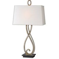 a table lamp with a white shade on it's side and a black base