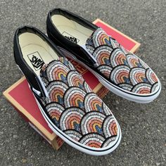 Bohemian style rainbow pattern on black Vans slip on shoes. Perfect for your Boho style.  We source each pair of blank shoes BRAND NEW from the Vans retail store. The ink is permanent and will never come off. Made in the USA. This price includes everything: shoes, artwork, and shipping. Thanks for stopping by our Etsy shop! Please message us with any questions! Sizes listed are in US sizing scale. If you have any issues with your order, please feel free to reach out to us and we will be more than glad to help you! Note: Blvd Custom is in no way affiliated with any of the shoe brands or companies that are featured on our website. Each pair of shoes is ordered lawfully bought at retail price. Multicolor Low-top Slip-ons With Rubber Sole, Multicolor Slip-ons With Rubber Sole, Vans Slip On Shoes, Vans Shoes Fashion, Skater Shoes, Formal Men Outfit, Black Vans, Vans Slip On, Vans Sneakers