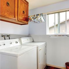 a washer and dryer in a small room