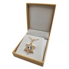 "This absolutely gorgeous and uniquely designed 14K yellow & white gold Star of David is both meaningful and stylish. This Stunning Pendant includes perhaps the two most well-known Judaic symbols: The Star of David and the Lion of Judah. The Star of David is one of the most popular decorative motifs in all sorts of Judaica, jewelry and art, owing to its beautiful geometric symmetry and powerful symbolism. People from all kinds of backgrounds are wearing the Star of David because of the deep White Star Of David Jewelry Gift, Luxury White Star-shaped Jewelry, Magen David Necklace, Animals Jewelry, The Lion Of Judah, Hamsa Jewelry, Wedding Rings Photos, Lion Pendant, Jewish Star