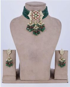 Pretty fine Kundan choker necklace with matching earrings in  Polki stones Highest quality and craftsmanship. Arrives in a box Please let me know if you have any questions Festive Temple Jewelry Choker For Reception, Traditional Hand-set Kundan Choker Necklace, Traditional Hand Set Kundan Choker Necklace, Celebration Kundan Choker Necklace, Kundan Choker Jewelry Sets For Celebration, Hand Set Kundan Choker For Celebration, Celebration Hand Set Kundan Choker Necklace, Festive Stone Work Choker For Reception, Temple Jewelry Kundan Choker For Reception