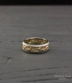 Featuring a stunning silver and gold Vine design, this filigree ring is a unique nature-inspired piece that symbolizes the beauty and resilience of your love. Heirloom Etched Jewelry For Wedding, Heirloom Etched Wedding Jewelry, Yellow Gold Filigree Jewelry For Marriage, 14k Gold Filigree Wedding Ring With Decorative Band, 14k Gold Jewelry With Intricate Design For Marriage, Wedding Filigree Ring With Intricate Design In 14k Gold, Intricate Yellow Gold Ring For Marriage, Gold Engraved Ring With Intricate Design For Marriage, Yellow Gold Ring With Intricate Design For Marriage