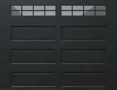 a black garage door with three windows