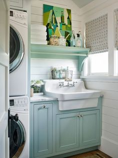 a washer and dryer in a small room