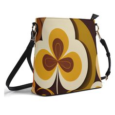 Get groovy with our Flower Power Retro Crossbody Bucket Bag! This Mid Century Modern Vintage Style Handbag is perfect for adding a whimsical touch to any outfit. Securely carry your essentials in style with this funky and functional bag. * PU Leather: High-quality PU leather combines sophistication with durability. * Adjustable Shoulder Strap: Customize the fit with a detachable and adjustable shoulder strap * Secure Zipper Closure: Features a secure zipper closure to protect your belongings. * Retro Multicolor Bags With Zipper Closure, Retro Bags With Zipper Closure For Gift, Retro Bag With Zipper Closure As Gift, Retro Gift Bag With Zipper Closure, Retro Shoulder Bag With Zipper Closure, Retro Yellow Shoulder Bag With Adjustable Strap, Retro Yellow Bag As Gift, Retro Yellow Bag For Gift, Vintage Multicolor Bag With Zipper Closure