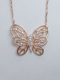 This necklace will be a nice gift for your loved ones with its meaning and style.🦋 🦋What does the butterfly icon mean? The butterfly symbolizes youth and dynamism in the Far East. In ancient Greece, it symbolizes the influence of the soul on the body and the great changes this effect creates. In ancient wisdom, the Butterfly is a direct symbol of the soul, symbolizing the freedom, lightness and grace of the soul. PRODUCT FEATURES; ✰ Weigth: 3gr ✰ Height: 44 Cm - 17.03 Inches (in video) but optional ✰Color🎨: Rose Gold ✰Pendant Height: 1 cm - 0.39 Inches ✰Material: 925 Silver * This carefully made necklace will be a display of simplicity and elegance on your neck. * All of our products are handmade and their materials are 925 sterling silver. 💎MATERİAL * 925 Sterling Silver -  Rose Gold Mother's Day Jewelry With Butterfly Charm, Mother's Day Butterfly Jewelry With Butterfly Charm, Mother's Day Butterfly Charm Jewelry, Mother's Day Butterfly Charm Pendant Necklace, Mother's Day Butterfly Pendant Necklace, Butterfly Necklace As A Gift, Round Butterfly Necklace Gift, Round Butterfly Necklace For Gift, Rose Gold Butterfly Pendant Necklace With Delicate Chain