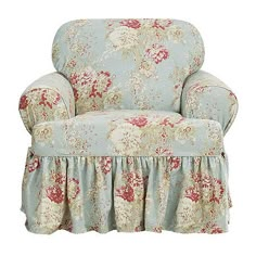 a blue chair with floral print and ruffles on the skirted armrest