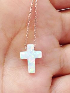 Synthetic White Opal Cross pendant, comes with a 925 Sterling Silver necklace, Yellow gold plated, Rose gold plated. Notice that this necklace comes with extender to adjust to different lengths. Chain total length : 39.5 cm / 15.5 inches not included extender. Extender length : 2.5 cm / 1 inche approximately Cross size: 12mm x 9mm Spring clasp Our jewelry is packaged in a beautiful gift box. If you need a necklace as a gift, we can ship to third party. During check out, please leave a note in th Necklace Cross, Necklace White, Cross Pendant Necklace, White Opal, Opal Jewelry, Third Party, Beautiful Gift Boxes, Sterling Silver Necklace, Cute Jewelry