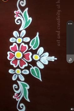 an image of a flower design painted on the side of a wooden surface with white and red flowers