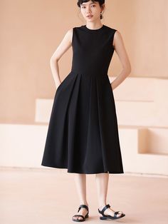 A sleeveless dress with a gently flared hem that gives you the look of a movie actress. This item is sewn high at the waist and creates a beautiful silhouette. Wear it with a cardigan or jacket for all seasons. 
 
 
 
 
 
 
 
 
 
 
 
 
 
 
 
 Size 
 
 
 S size 
 
 
 Length: 110cm 
 Shoulder width: 36cm 
 Bust: 85cm 
 Waist: 68cm 
 
 M size 
 
 Length: 111.5cm 
 Shoulder width: 37cm 
 Bust: 89cm 
 Waist: 72cm 
 
 L size 
 
 Length: 113cm 
 Shoulder width: 38cm 
 Bust: 93cm 
 Waist: 76cm 
 
 XL si Chic A-line Sleeveless Dress With Box Pleat, Elegant A-line Sleeveless Dress With Flattering Silhouette, Spring Sleeveless A-line Dress With Pleated Back, Chic A-line Tea Length Dress With Pleated Bodice, Chic A-line Dress With Pleated Waist, Elegant Sleeveless A-line Fit And Flare Dress, Elegant A-line Fit And Flare Sleeveless Dress, Chic A-line Pleated Dress, Chic Sleeveless A-line Dress With Box Pleat