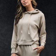 The softest hoodie ever! This Essential Collection pullover will soothe you into a cozy bliss thanks to its midweight design and unparalleled comfort. Made from ultra-soft, 4-way stretch modal fleece, it is a perfect year-round staple. Cozy Fit Athleisure Hoodie For Loungewear, Solid Color Comfy Hoodie For Loungewear, Solid Color Hoodie With Ribbed Cuffs For Lounging, Athleisure Hoodie With Ribbed Cuffs For Lounging, Lounging Hoodie With Ribbed Cuffs, Comfortable Loungewear Sweatshirt With Drawstring Hood, Comfortable Drawstring Hood Sweatshirt For Loungewear, Cozy Stretch Solid Hoodie, Fall Season Hoodie Activewear For Loungewear