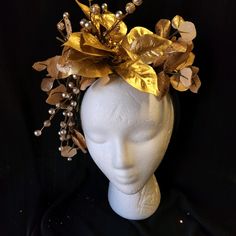 This gorgeous statement piece can be used on so many different occasions! Look like a lady from Bridgerton with a golden or silver, one of a kind, custom made to order headpiece that will wow.   New Year's Eve headpiece, a  crown for your costume, Wedding Headpiece,  Kentucky Derby fascinator, etc! You are sure to get a million compliments with this show stopping accessory.   Headband is one size fits all, gold adornments, glitter. Gold Ceremonial Headpiece With Tall Crown, Mardi Gras Party Crown Headpiece, Traditional Gold Structured Crown Headpiece, Traditional Gold Headpiece With Tall Crown, Traditional Gold Headpiece With Structured Crown, Gold Costume Hat With Tall Crown, Gold Tall Crown Costume Hat, Fitted Gold Costume Hat For Carnival, Fitted Gold Carnival Costume Hat