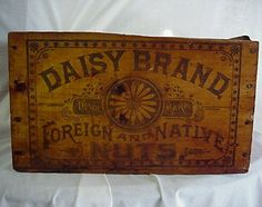 an old wooden box with the words daisy brand on it