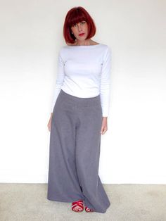 Anna Beach Trousers have been designed to give you the romantic feel of the 1930's.  Wide leg trousers with an easy fit, yet styled with a modern low fit waist (it sits approximately 2cm  below waist) , which is faced rather than having a waistband. The opening is at the side by an invisible zip application. Back patch pockets. A lovely pattern for those who have some knowledge of sewing. Sizes: UK 8 - 18 Suggested fabrics: Cottons, linens, rayons, double crepe, corduroy and materials with drape Fitted Cotton Wide Leg Pants For Daywear, Fitted Linen Wide Leg Full Length Pants, Fitted Wide-leg Pants For Daywear, Beach Trousers, Trousers Women Wide Leg, Beach Pants, Invisible Zip, Pantalon Large, Back Patch