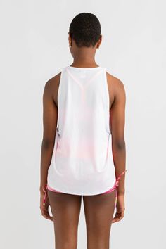 Throw it on and forget it. The ideal style singlet tank top to layer over crop tops. Designed in a crisp white colour with large neon pop Every Turn logo. Styled in a looser fitting shape with a higher round neckline and dropped armholes. Hot Shots, White Colour, White Tank Top, White Color, Round Neckline, Active Wear, Loose Fitting, Twist, Tank Top