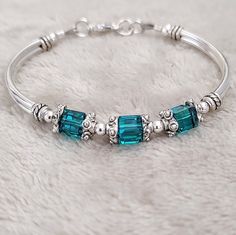 December Birthstone Bracelet Blue Topaz Bracelet Personalized - Etsy Zircon Bracelet, Topaz Bracelet, Beaded Bangles Bracelets, Bracelets Patterns, Blue Topaz Bracelet, Diy Bracelets Patterns, Bracelets Diy, Birthstone Bracelet, Bead Bangles