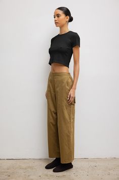 Cut in our anything but basic Kelly Cotton Rib, The Kelly Crop Slim Fit Tee is the perfect high waist pant companion. Featuring a crew neckline, a just right cropped length, and clean, tailored finishing. Shop all styles in this fabric group Cropped Cotton Pants With Pockets, Casual Cropped Bottoms For Work, Everyday Cropped Cotton Bottoms, Versatile Cropped Workwear Bottoms, Cotton Crop Top For Workwear, Cotton Workwear Crop Top, Versatile Solid Color Cotton Crop Top, Casual Solid Color Cropped Pants, Casual Solid Cropped Pants