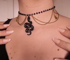 Collares hechos a mano con abalorios colgantes. Los collares se ajustan al cuello a modo de gargantilla pero puedes alargarlos para que lo lleves como más desees ya que son totalmente ajustables ❤ ---- ¿Quiéres que te enseñe como empaqueto y preparo tu pedido? ✿ ¡Házmelo saber en la nota del pedido! Déjame tu instagram o tu tik tok para poder mencionarte en el vídeo :) ---- ❤ IMPORTANTE ❤ A la hora de realizar tu pedido, ten en cuenta que encontrarás 2 opciones de envío: ❤ La primera opción es e Halloween Adjustable Chain Choker, Adjustable Dangle Beaded Necklaces For Party, Adjustable Beaded Dangle Necklaces For Party, Adjustable Beaded Dangle Necklace For Party, Gothic Handmade Adjustable Beaded Necklaces, Handmade Adjustable Gothic Beaded Necklaces, Party Beaded Necklace With Adjustable Chain, Adjustable Chain Necklace For Halloween, Adjustable Beaded Necklaces For Party