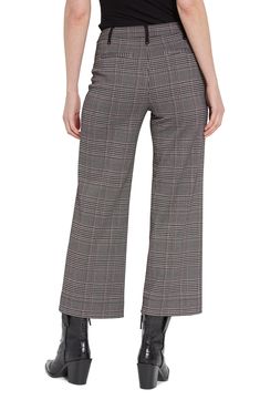 A classic houndstooth pattern adds to the chic style of stretchy, figure-hugging ponte pants that release into cropped wide legs below the knee. Faux-suede belt loops with gunmetal studs complete the look with a hint of edge. 27" inseam; 10" front rise; 15 1/2" back rise Pull-on style Back welt pockets Four-way-stretch fabric 53% polyester, 44% viscose, 3% elastane Machine wash, line dry Imported Chic Plaid Wide Leg Pants, Tailored Houndstooth Bottoms For Fall, Elegant High-waisted Plaid Pants, Elegant Plaid Wide-leg Pants, Chic Plaid Bottoms For Business Casual, Chic Stretch Plaid Bottoms, Fitted Bottoms With Houndstooth Pattern, Classic Houndstooth Pattern Bottoms, Formal Plaid Wide Leg Bottoms