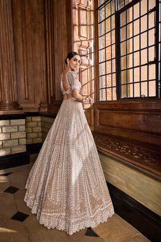 Champagne Pearl Lehenga Set – Panache by Sharmeen Seema Gujral Lehenga, Festive Floor-length Beige Lehenga, Anarkali Style Beige Choli For Reception, Beige Anarkali Floor-length Choli, Glamorous Anarkali Set With Intricate Embroidery For Reception, Beige Floor-length Gown With Sheer Dupatta, Beige Choli With Sheer Dupatta For Reception, Traditional Embellished Beige Lehenga, Embellished Beige Sharara For Reception