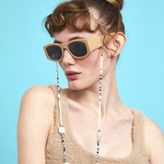 To see all our 85 different colours sunglasses chains please click on the link below. https://www.etsy.com/uk/shop/ChainsAndShades?section_id=37905546 Hand strung, four pieces square baroque pearls, round mother of pearls and faceted mix semi-precious stones. Gold plated , non tarnish beads, clasps and connectors. Can be worn as a necklace and glasses chain or simply as a mask holder. Comes with extra set of rubber loops. Length: 70cm approx. Trendy Party Glasses Chains With Adjustable Chain, Trendy Handmade Glasses Chains For Party, Trendy Adjustable Party Glasses Chains, Trendy Beaded Glasses Chains As Fashion Accessory, Trendy Pearl Glasses Chain As Gift, Summer Party Beaded Glasses Chains, Elegant Glass Glasses Chains For Beach, Elegant Summer Party Glasses Chains, Party Pearl Glasses Chain