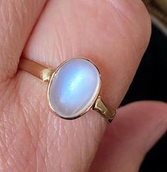 This item is a beautiful antique 750 18ct gold magical flashing moonstone ring.  It measures approximately :- U.K. size - 'T' U.S. size - '10' The ring face measures approximately 1cm by 0.8cms, it weighs approximately - 2.52gms.   Its hallmarked 18ct but also professionally tested as 750 /18ct gold.  Please see photos for a more detailed description. Box in photographs not included in the sale.  Any wear & tear to be expected on a vintage item.(slight surface marks /internal natural line inclus The Ring Face, Natural Line, Moonstone Ring, Rings Statement, See Photo, Moonstone, Statement Rings, Jewelry Rings, Vintage Items