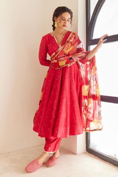 Red tiered anarkali embellished with sequin embroidery crafted in chanderi. Paired with a pant embellished with sequin embroidery and printed organza laced dupatta.
Components: 3
Pattern: Embroidered
Type Of Work: Sequin
Neckline: Round V
Sleeve Type: Three-quarter
Fabric: Kurta and Pant: Chanderi, Dupatta: Organza
Color: Red
Other Details: 
Length:
Anarkali: 45 inches
Pant: 40 inches
Occasion: Puja - Aza Fashions Designer Red Churidar With Sheer Dupatta, Red Churidar With Sheer Dupatta And Traditional Drape, Red Fitted Churidar With Sheer Dupatta, Red Semi-stitched Anarkali Set With Sheer Dupatta, Red Anarkali Cotton Silk Lehenga, Red Cotton Silk Lehenga With Dupatta, Red Anarkali With Sheer Dupatta, Anarkali Style Red Cotton Silk Lehenga, Red Bollywood Anarkali Set With Traditional Drape