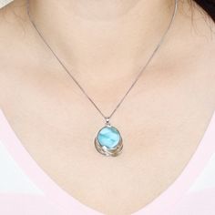 "Material:100% 925 Sterling Silver with White Gold Plated Main stone:Large Larimar Gemstone Other stone:N/A Total Weight:8g Size: 25mm x 25mm / 1 x 1\" Chain: 18\" Silver Chain Condition:New Main color:Blue Quantity:1 Pc This vintage pendant necklace is made with 100% natural genuine rare Larimar stone from Dominican Republic and solid 925 sterling silver w/ Rhodium gold plating for better quality and prolonged shine! *It comes with elegant velvet jewelry gift bag. Please check my other beautifu Larimar Gemstone Pendant Necklaces, Larimar Gemstone Pendant Necklace, Round Turquoise Aquamarine Necklace, Turquoise Aquamarine Round Necklace, Turquoise Aquamarine Necklace, Light Blue Sterling Silver Round Necklace, Light Blue Round Sterling Silver Necklace, Blue Larimar Pendant Necklace, Blue Larimar Jewelry For Jewelry Making